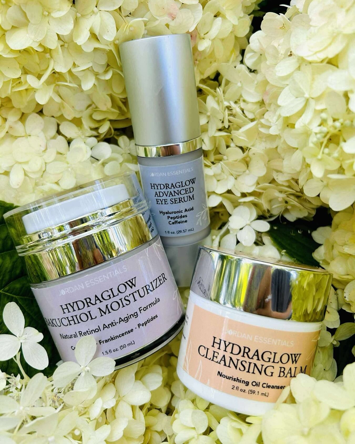 🌟New Product Spotlight: HydraGlow 🌟 
.
Your skin called… it wants HydraGlow!
.
💚 Cleasing Balm:  Balm-to-cleanser hybrid melts away dirt, sweat, makeup, sunscreen and even stubborn mascara without leaving your skin feeling tight or greasy. 
💚 Advanced Eye Serum:  A powerful blend of hyaluronic acid, peptides, caffeine, and plant-derived squalane delivers deep hydration while reducing puffiness, dark circles and fine lines. 
💚 Bakuchiol Moisturizer:  Powered by bakuchiol, an innovative plant-based alternative to retinol, this formula targets fine lines, uneven texture, and loss of firmness without redness or flaking.
.
Who’s ready for skin that looks like it’s been on vacation? 🙋🏻‍♀️